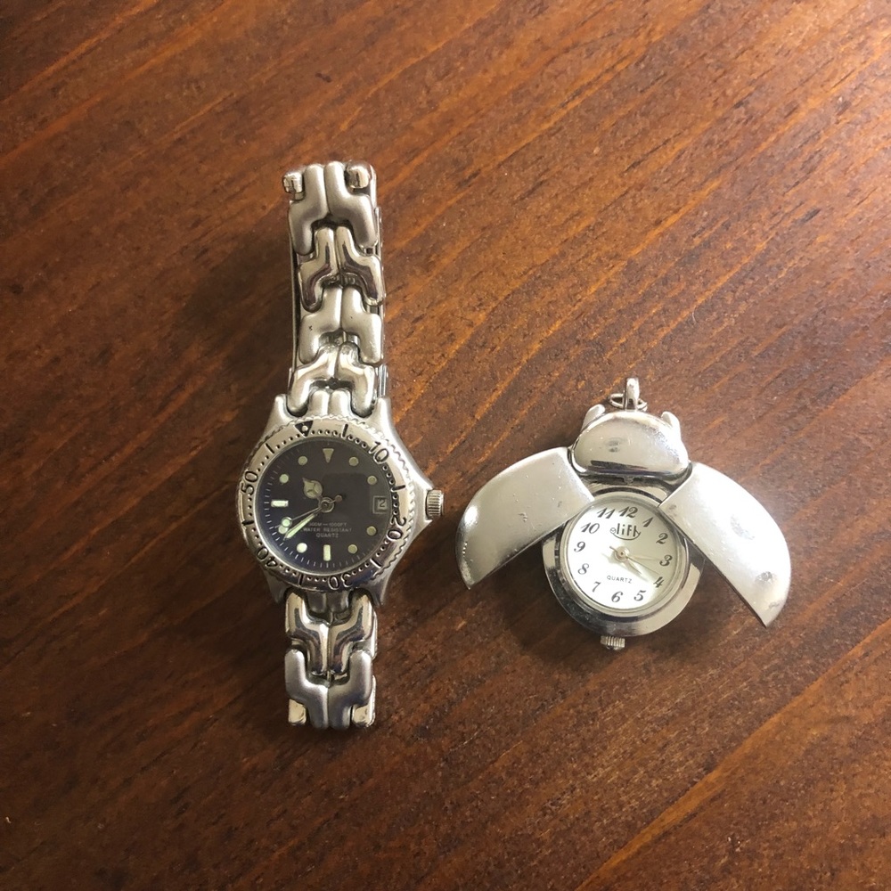 Silver colored ladies necklace watch and wristwatch not sure if they run